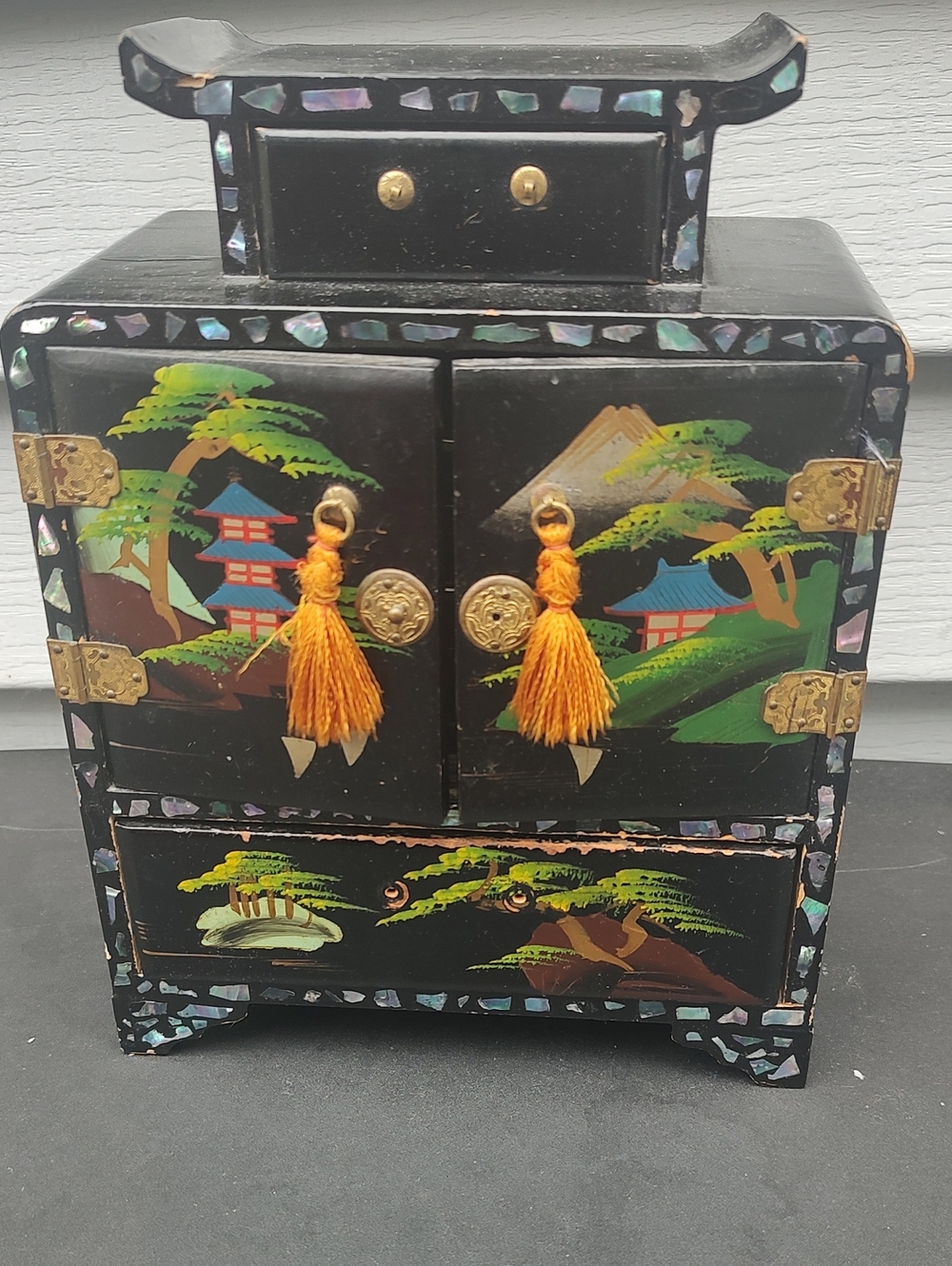Black Lacquered Asian-Inspired Jewelry Cabinet with Tassels